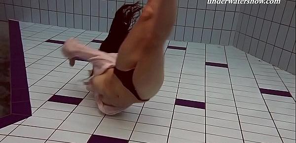  Paulinka underwater stripping babe
